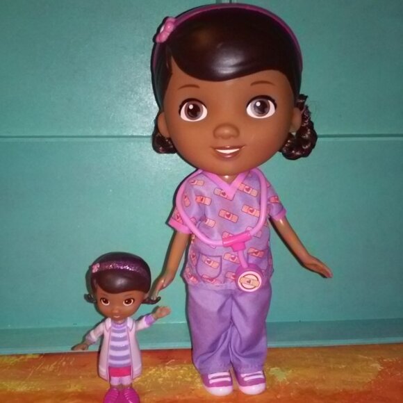 Doc Mcstuffins Doll in purple & pink  scrubs with a mini doc - Picture 2 of 8